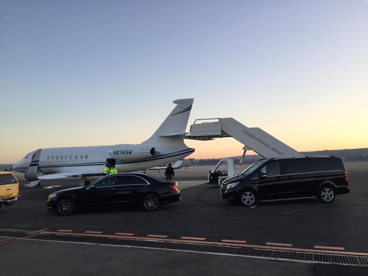 Car hire with driver services in Val Thorens: Mercedes S Class and V Class at the foot of a private jet on the tarmac